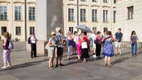 Prague guide ??? by the monolith in the third courtyard of Prague Castle