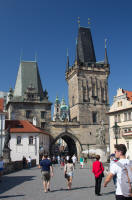 Western bridge towers of Charles Bridge, and statue of Wenceslaus I and statue of the Holy Saviour with Cosmas and Damian