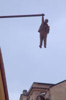 David Černý’s Viselec (“hanging out”) on Husova street