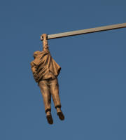 David Černý’s Viselec (“hanging out”) on Husova street