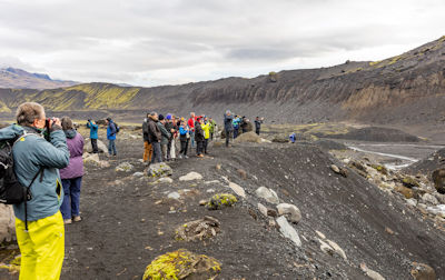 The tour group admires the glacier