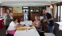 In the dining cabin: Fiona, Sally (hidden), Pauline, Greta and Dan