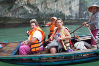 Pauline, Sally (? hidden), Hoi and Greta being rowed