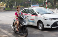 Mother and small child on motorbike