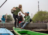 Emily Searson gets into a tour boat