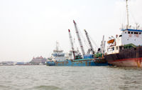 Ships outside Sunda Kelapa harbour, and the Batavia Marina restaurant