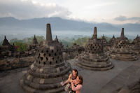 Borobudur, tourists, mist, hills