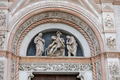 Reliefs above the Porta Magna of Basilica di San Petronio, carved by Jacopa della Quercia
