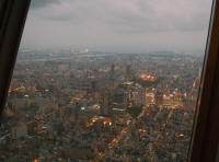 From the Tembo deck at 350m: view towards Tokyo Gate Bridge at dusk