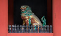 Guardian lion (?) in gate
