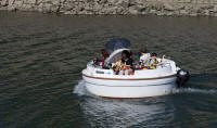 Circular boat on the Motoyasu River