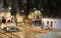 One of the scenes of Murugan's life and a shrine inside the Temple Cave
