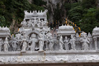 Carvings over the entrance at the base of steps leading to the Temple Cave
