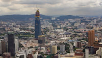 Skyscraper under construction, and the Capitol Hotel bottom-right