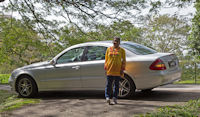 Nathan's wife Sham beside the tour car