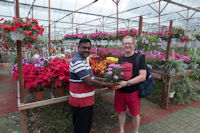 Tourist and flower magnate, near Thompson waterfalls, Brinchang