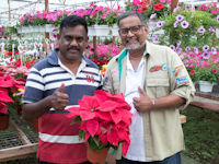 Nathan and flower magnate, near Thompson waterfalls, Brinchang
