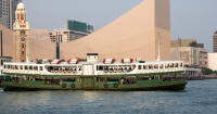 Star ferry in front of Clock Tower and HK Cultural Centre
