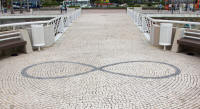 Infinity (?) loop in pavement outside Kun Iam Ecumenical Centre