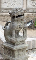 Traditional male & female lions guarding the A-Ma temple