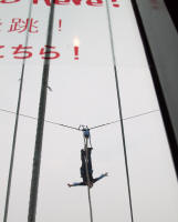 Bungy jumper falling past 58th floor