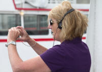 Anne takes a photograph