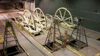 Cable tension adjusters