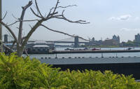 Downtown Manhattan heliport, with Brooklyn and Manhattan Bridges in the background